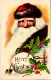 Xmas - Santa Claus close up with fur trimmed hat, snow ball, shovel in postcard