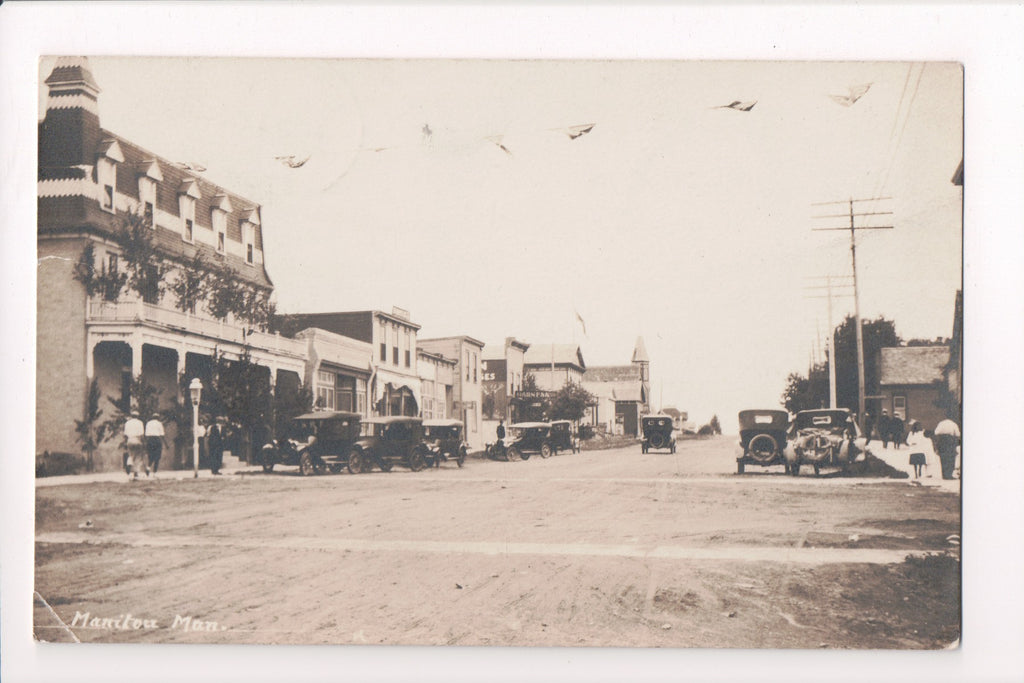 Canada - MANITOU, MB - Street scene with old cars - RPPC - G06001