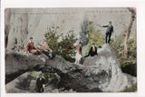 SD, WALL - man with pistol in outreached hand, people on rocks - MB0843